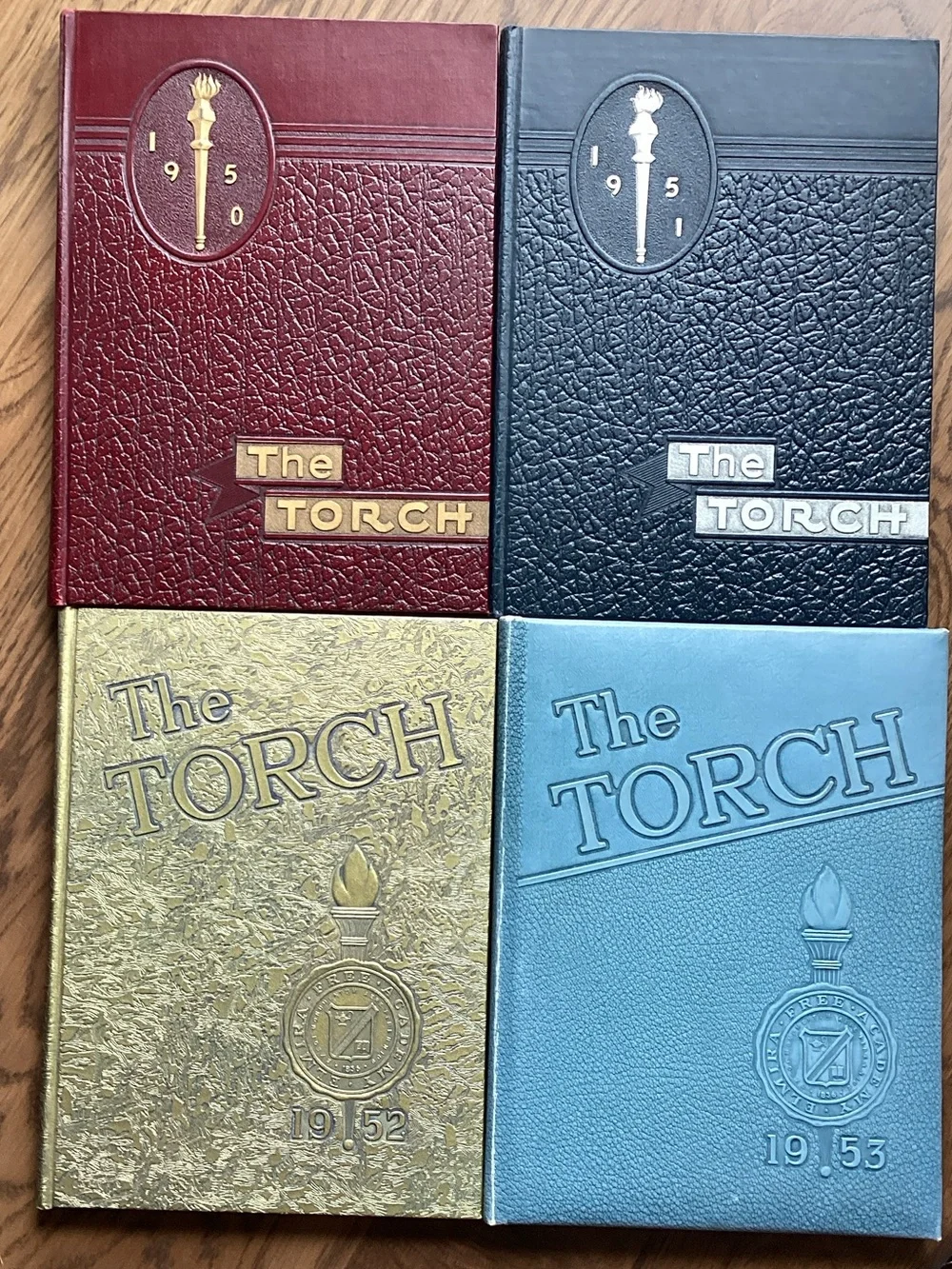 The Torch Hardcover Yearbook Set - Red, Black, Gold, Light Blue. EFA